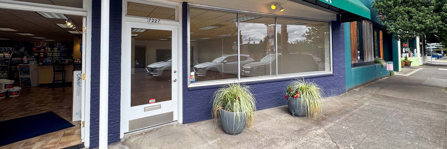 Dedicated street entrance at 7227 SE Milwaukie Ave with transom and mail slot
